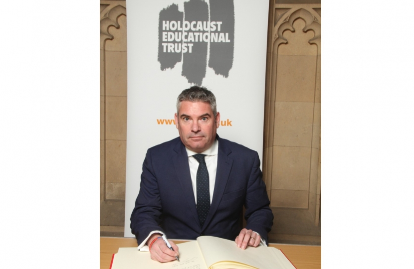 Craig signs Holocaust Book 